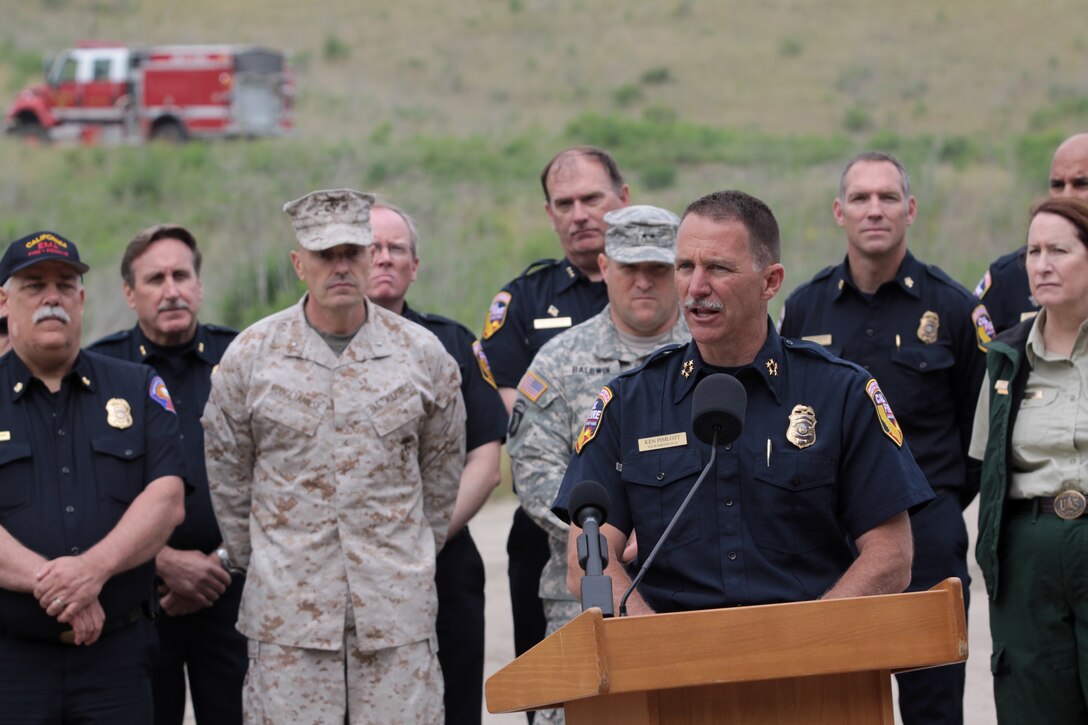 Ken Pimlott, the chief of the California Department of Forestry and Fire Protection (CAL Fire), takes a moment to thank Brig. Gen. Vincent A. Coglianese, the commanding general of MCI-West, and all those who participated in making this years Wild land Firefighting Exercise a success, May 10.