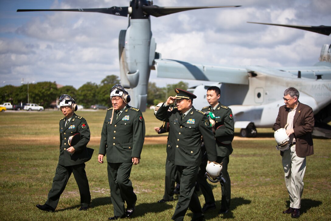 The People’s Republic of China Minister of National Defense Gen. Liang Guanglie (second from left) visits Marine Corps Base Camp Lejeune, N.C., May 9. During the visit, II MEF Marines showcased several Marine Corps vehicles and equipment sets to highlight the Corps’ emphasis on training and professional development and its capabilities and role in U.S. and global security.   Liang and the rest of the Chinese delegation are in the midst of a tour of several military installations on the East and West Coasts at the invitation of U.S. Secretary of Defense Leon Panetta. The purpose of these visits is to highlight the improvement of the U.S.’s capacity to cooperate in areas of mutual interest, such as humanitarian assistance and disaster relief, and addressing non-traditional and transnational security threats and counter-piracy.