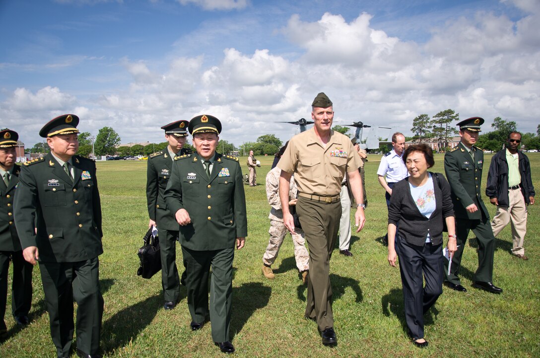 The People’s Republic of China Minister of National Defense Gen. Liang Guanglie is accompanied by Brig. Gen. Christopher Owens, the deputy commanding general of II Marine Expeditionary Force, during his visit to Marine Corps Base Camp Lejeune, N.C., May 9. During the visit, II MEF Marines showcased several Marine Corps vehicles and equipment sets to highlight the Corps’ emphasis on training and professional development and its capabilities and role in U.S. and global security.   Liang and the rest of the Chinese delegation are in the midst of a tour of several military installations on the East and West Coasts at the invitation of U.S. Secretary of Defense Leon Panetta. The purpose of these visits is to highlight the improvement of the U.S.’s capacity to cooperate in areas of mutual interest, such as humanitarian assistance and disaster relief, and addressing non-traditional and transnational security threats and counter-piracy.