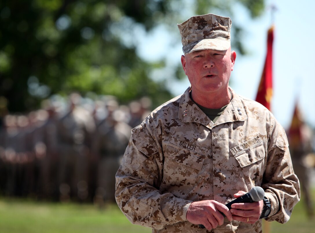 Major Gen. W. Lee Miller Jr., the assistant division commander of 2nd Marine Division, speaks about his time working alongside Sgt. Maj. John C. Carman of Toledo, Ohio, during Carman’s retirement ceremony May 11.  Miller praised Carman’s performance as the sergeant major of 2nd Marine Division’s Force Generation Element when he was acting as the divison’s commanding general throughout 2011 and into 2012.“This past year and a half could have been the worst of times I’ve ever had but it wasn’t,” said Miller.  “It was a great time because of the sage wisdom and advice Sgt. Maj. Carman provided to me as well as the other sergeants major within the division.”  (Official U.S. Marine Corps photo by Cpl. Tommy Bellegarde)::r::::n::