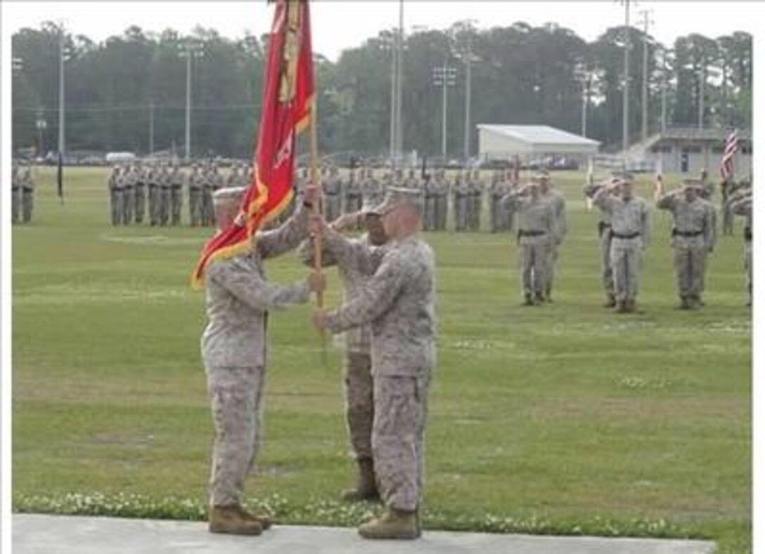 Lt.Col Miller gives command to new CO Lt.Col Wolf