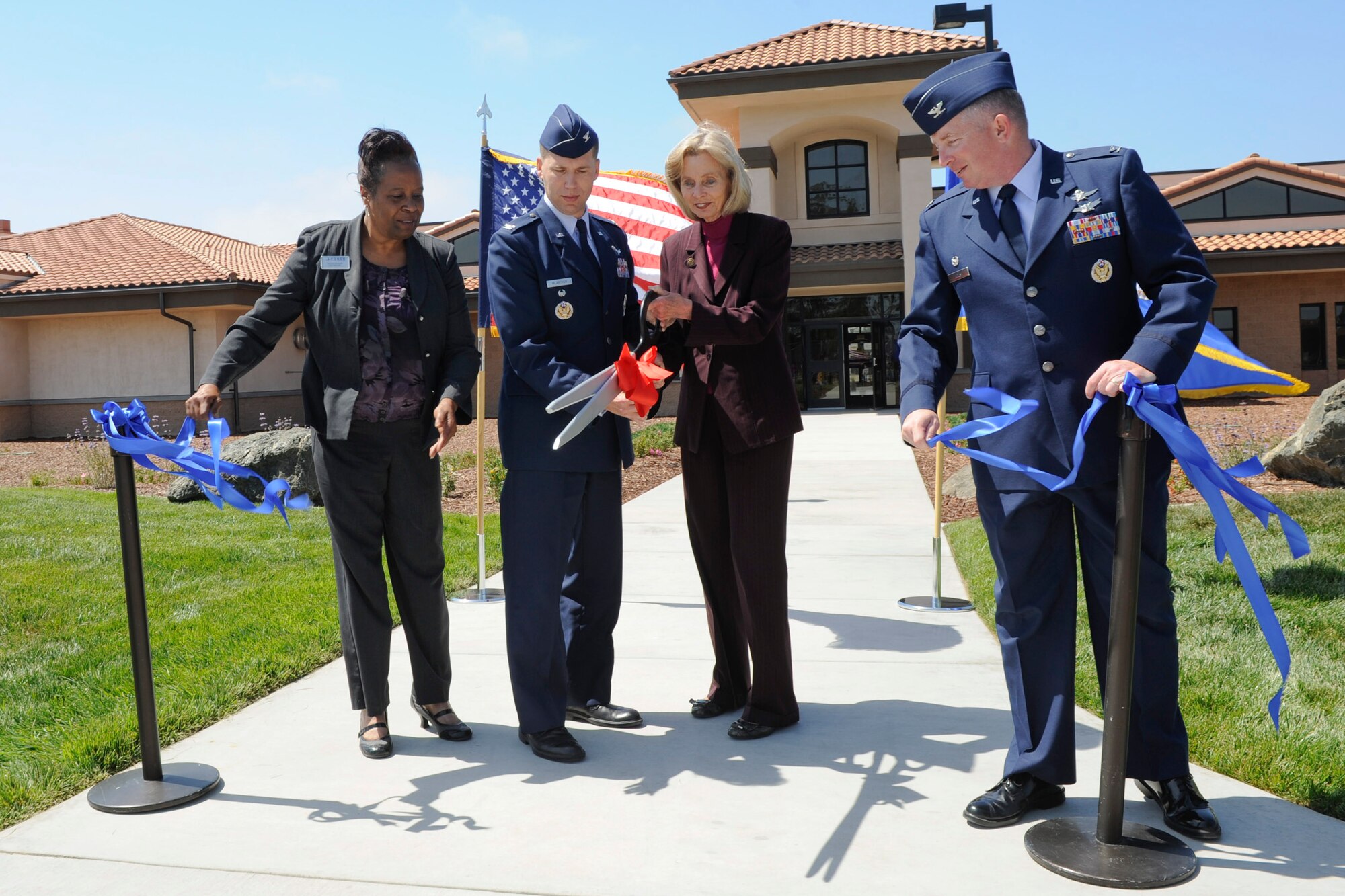 VANDENBERG AIR FORCE BASE, Calif.-- Verna Brown, Vandenberg Child Development Center director, Col. Brent McArthur, 30th Space Wing vice commander, U.S. Congresswoman Lois Capps and Col. Kelly Kirts, 30th Mission Support Group commander, cut the ribbon to the new Child Development Center here Friday, May 11th, 2012. The new facility is slated to open to base-affiliated children May 21, and will provide 37 more child care slots. (U.S. Air Force photo/Staff Sgt. Levi Riendeau)
