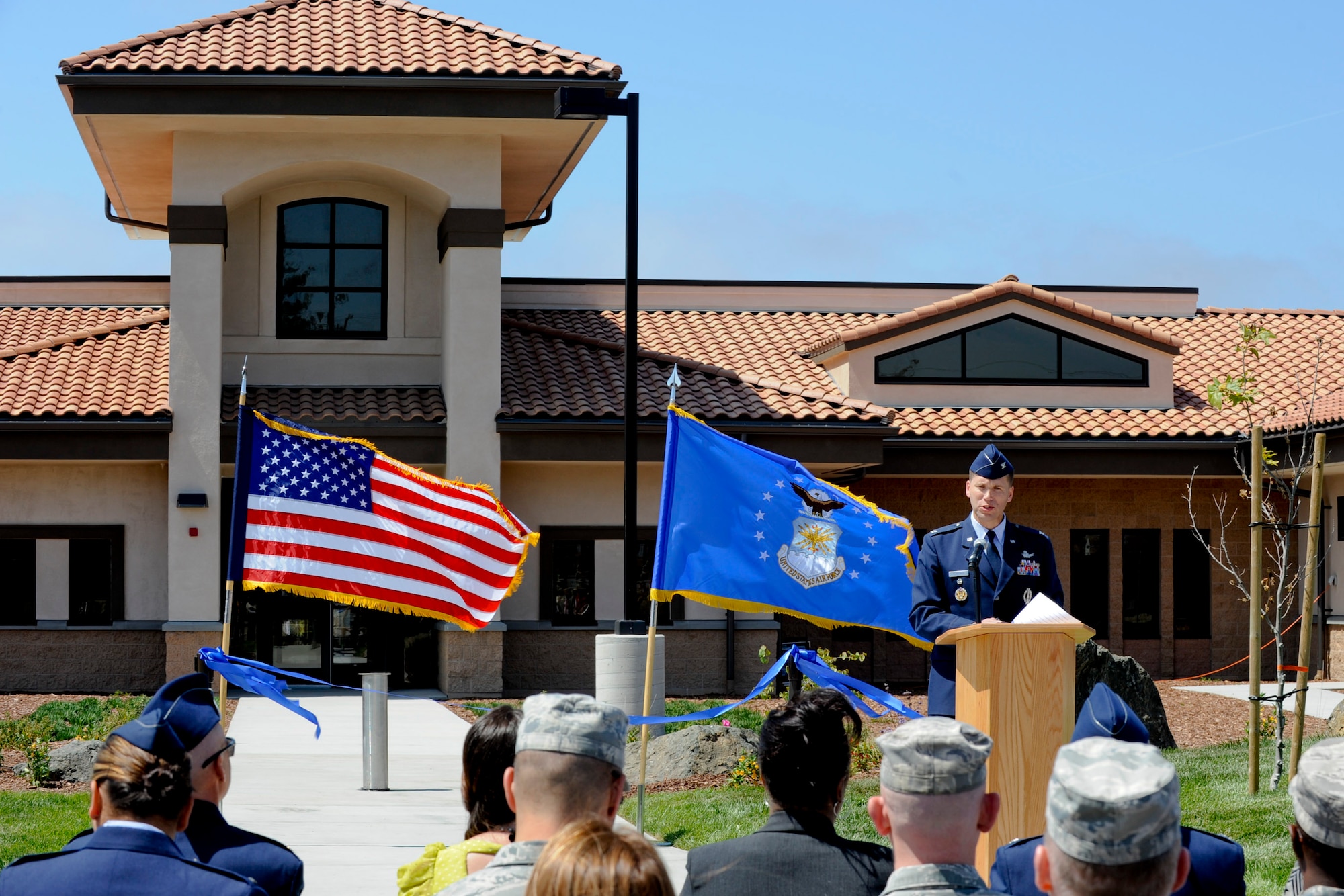 VANDENBERG AIR FORCE BASE, Calif.-- Col. Brent McArthur, 30th Space Wing vice commander, speaks during the ribbon cutting of the new Child Development Center here Friday, May 11th, 2012. The new facility is slated to open to base-affiliated children May 21, and will provide 37 more child care slots. (U.S. Air Force photo/Staff Sgt. Levi Riendeau)