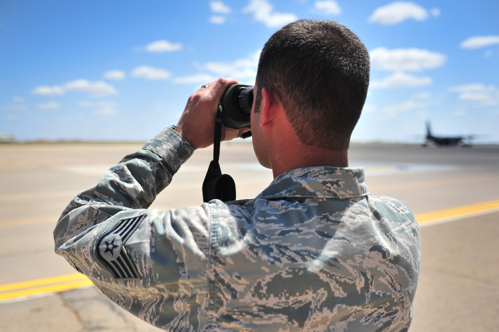 U.S. Air Force Staff Sgt. Phillip Tori, 27th Special Operations Support Squadron weather forecaster, takes an area observation near the flightline at Cannon Air Force Base, N.M., May 9, 2012. Troops with the weather flight at Cannon are able to gather observational data and post observations within minutes utilizing advanced equipment to aide them in their work. (U.S. Air Force photo by Airman 1st Class Alexxis Pons Abascal)  