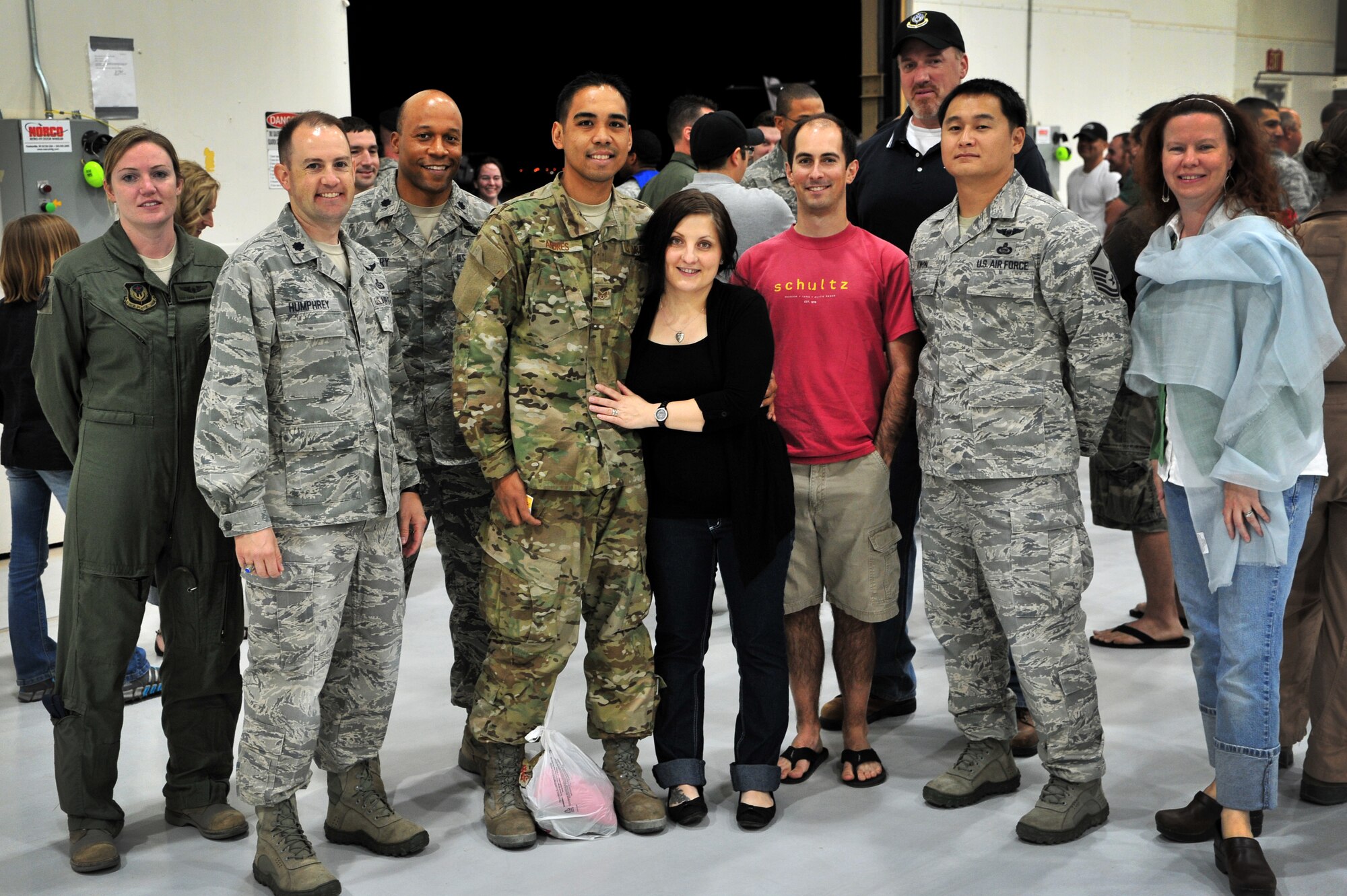 Members of the 43rd Intelligence Squadron pose during Operation Homecoming at Cannon Air Force Base, N.M., May 6, 2012. Operation Homecoming is a monthly event held to welcome Air Commandos back from worldwide deployments and reunite them with family and friends. (U.S. Air Force Photo by Airman 1st Class Xavier Lockley)