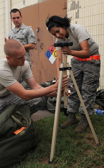 Barksdale Airmen set up a chemical agent detection paper stand during an Ability to Survive and Operate exercise on Barksdale Air Force Base, La., May 11. The paper is used to detect nerve and blister agents in the area they are placed. The paper will change colors when it contacts a nerve or blister agent. (U.S. Air Force photo/Airman 1st Class Benjamin Gonsier)(RELEASED)
