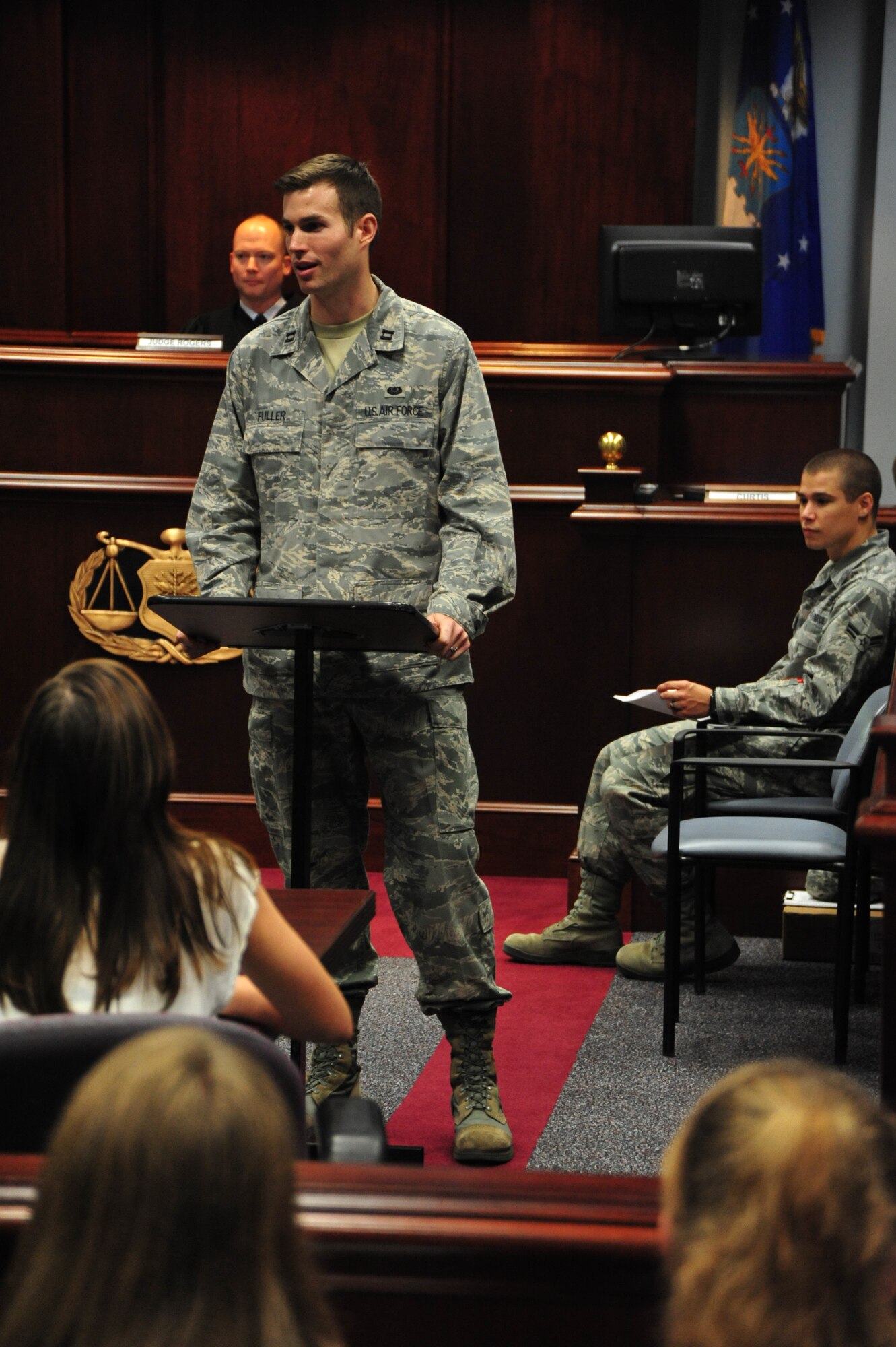 Capt. Clayton Fuller, chief of justice at the Maxwell legal office, speaks to middle school students on Law Day May 1 at the Judge Advocate General's School on Maxwell. Fuller helped educate the students in a 13-week course about the judicial system. (Air Force photo by Airman 1st Class William Blankenship)