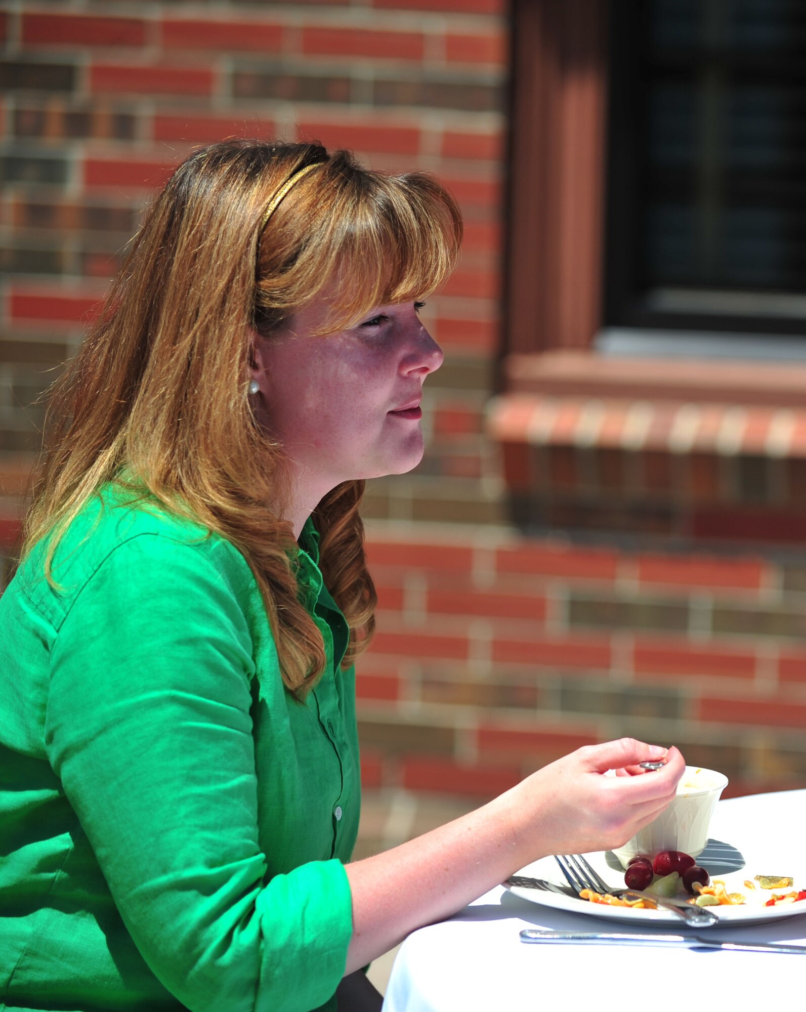 Cassie Bends, wife of Staff Sgt. Bradford Bends II, 633rd Civil Engineer Squadron explosive ordnance disposal technician, speaks to Kristin Auch, wife of Col. Korvin Auch, 633rd Air Base Wing commander, during a lunch at the Langley Club, Langley Air Force Base, Va., May 11, 2012. The lunch was held on Spouse Appreciation Day, which serves as a reminder that while spouses do not wear uniforms, they still sacrifice and serve their country.  (U.S. Air Force photo by Senior Airman Jarad A. Denton)