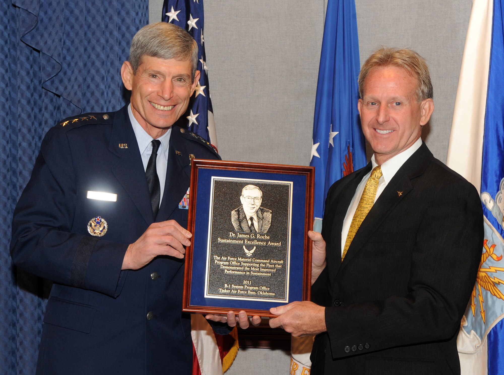 William Barnes, from Tinker Air Force Base, Okla., receives the Dr. James G. Roche Sustainment Excellence award from Air Force Chief of Staff Gen. Norton Schwartz during a Pentagon ceremony May 9, 2012.  Barnes is the deputy chief, B-1 systems program office at Tinker. (Air Force photo by Andy Morataya)