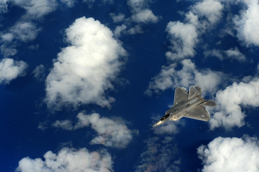 An F-22 Raptor from the Hawaii Air National Guard conducts training over the Pacific near the Hawaiian island of Oahu, March 22, 2012. The Raptors are assigned to the 199th Fighter Squadron, HIANG, and the 19th FS, 15th Wing, Joint Base Pearl Harbor-Hickam. (U.S. Air Force photo/Staff Sgt Mike Meares/Released)
