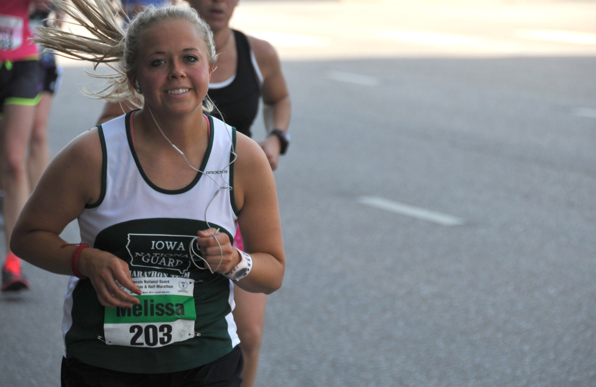 Tech Sgt. Melissa Knight, member of the 185th Air Refueling Wing, Sioux City, Iowa, completes the first half of the Lincoln National Guard Marathon on May, 6, 2012. Knight has represented the Iowa National Guard Marathon Team since 2008. (Air Force Photo by TSgt Richard Murphy. Released.)