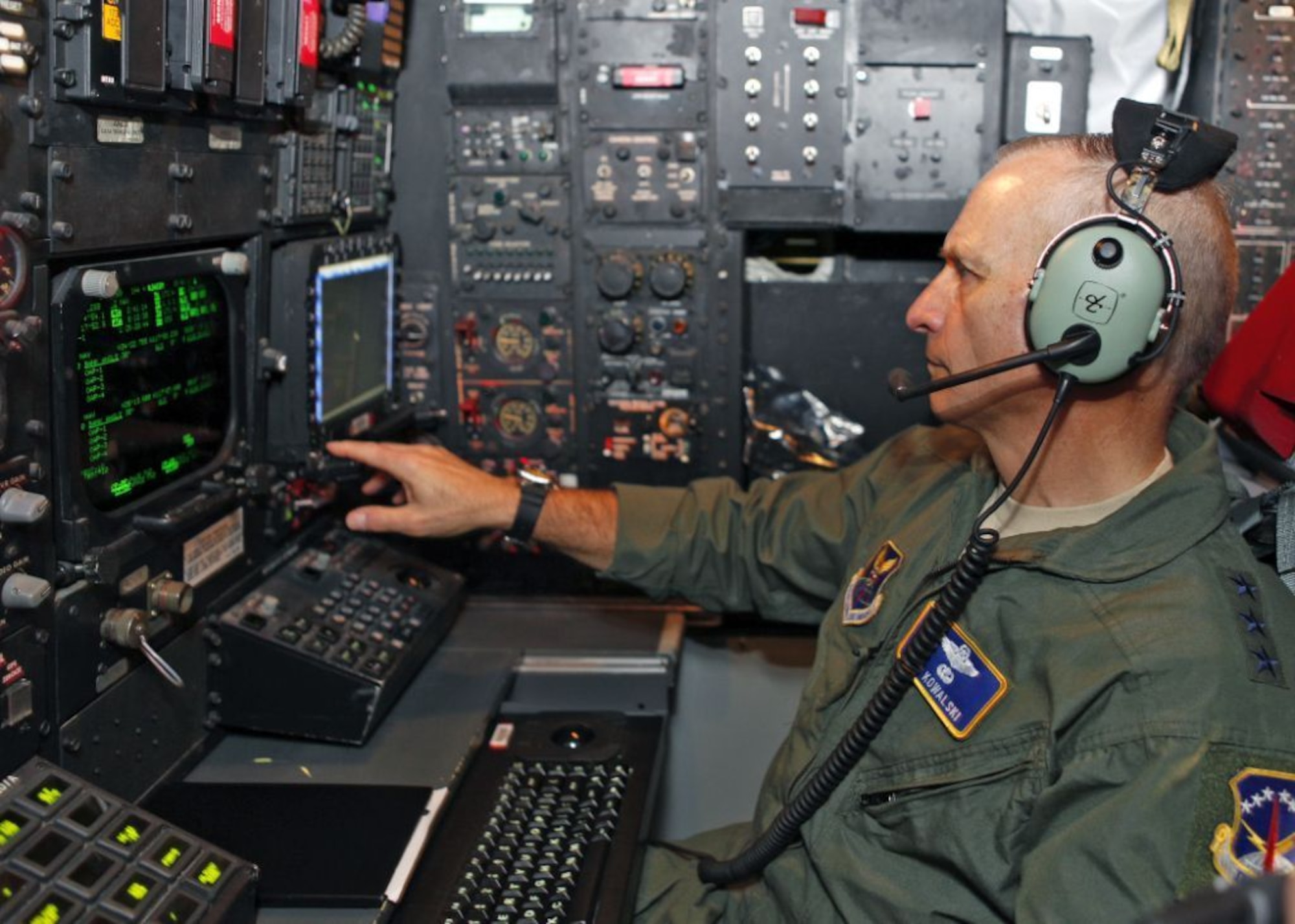 EDWARDS AIR FORCE BASE, Calif. - Commander of Air Force Global Strike Command, Lt. Gen. Jim Kowalski, operates the Combat Network Communications Technology (CONECT) program on board a test B-52H Stratofortress bomber at Edwards Air Force Base, Calif., during a recent visit. The communications program is designed to bring the B-52H from the analog to the digital age enabling it to effectively communicate, integrate and network within the joint force environment. (U.S. Air Force photo by Jet Fabara)