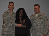 While Ms. Lisa Jokines (center) isn't new to the 916th Air Refueling Wing, she did win the 2011 Junior Civilian of the Year award recently. Congrats Ms. Lisa! (USAF photo by Maj. Shannon Mann, 916ARW/PA, released)