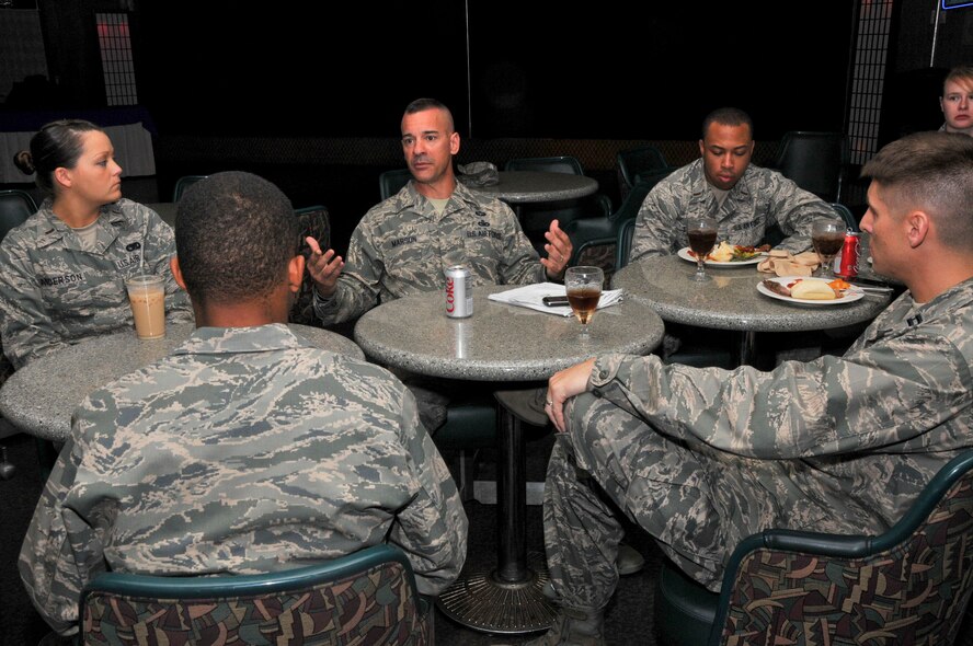 U.S. Air Force Chief Master Sgt. Mark Marson, 18th Wing command chief, speaks to company grade officers during a professional development meeting hosted by the Company Grade Officers' Council at Kadena Air Base, Japan, May 10. The chief spoke about the enlisted perspective and gave mentorship advice to the junior officers.  (U.S. Air Force photo/Staff Sgt. Darnell T. Cannady)  