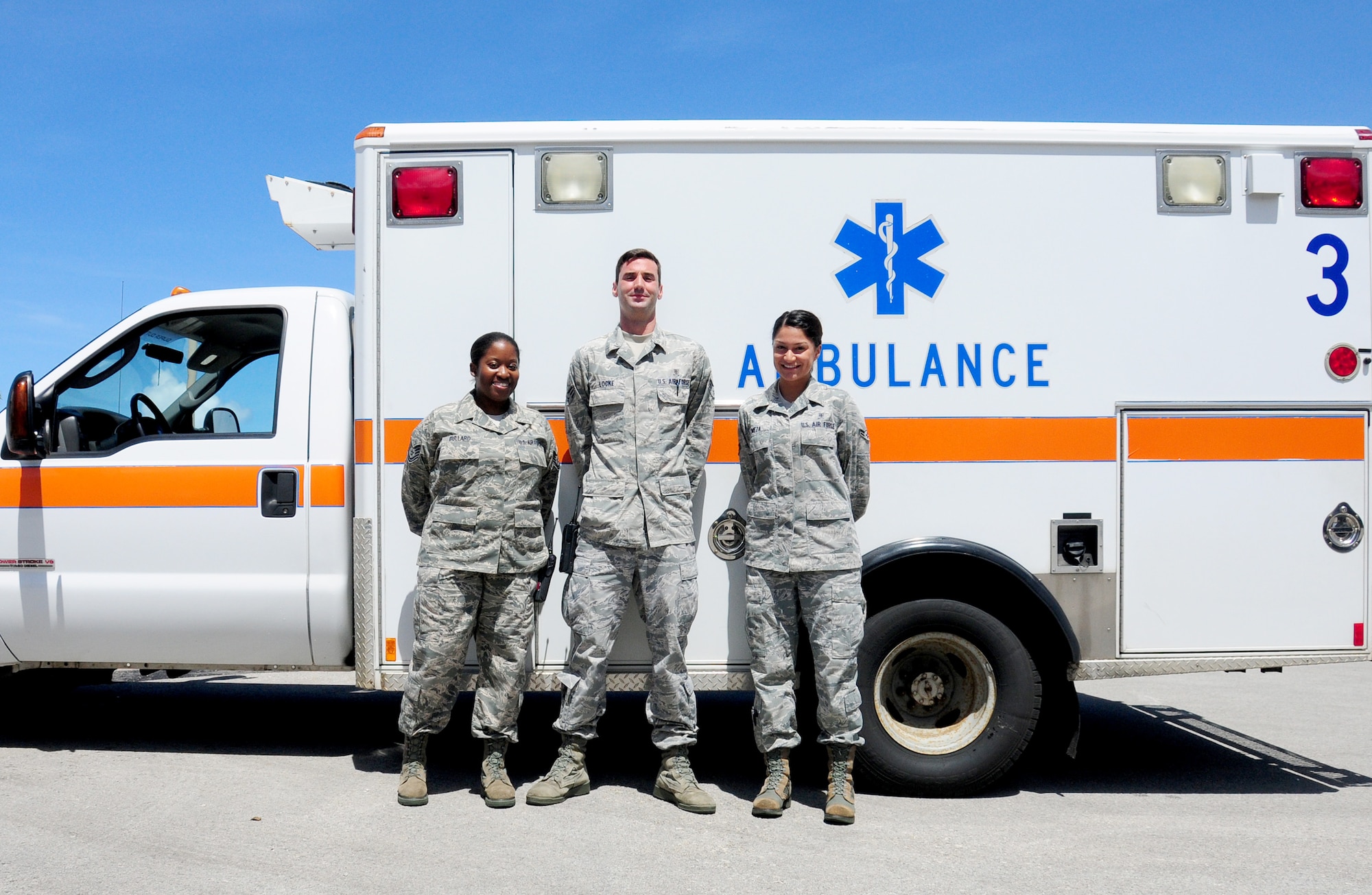 ANDERSEN AIR FORCE BASE, Guam-Emergency response Airmen from the 36th Medical Group stand in front of an ambulance in recognition of the recent ambulatory services upgrades May 7. The new services upgrades include the ability for the Airmen to use new pharmaceuticals in route to the hospital as well as administer electrocardiograms. (U.S Air Force photo by Senior Airman Jeffrey Schultze)  