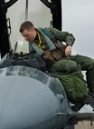 U.S. Air Force Capt. Jason Schaub, 14th Fighter Squadron pilot, climbs into the cockpit of an F-16 Fighting Falcon during the Diesel Weasel Exercise at Misawa Air Base, Japan, May 10, 2012. The Diesel Weasel Exercise tests pilots’ ability to provide close air support during realistic exercise scenarios. (U.S. Air Force photo by Staff Sgt. Nathan Lipscomb/Released)
