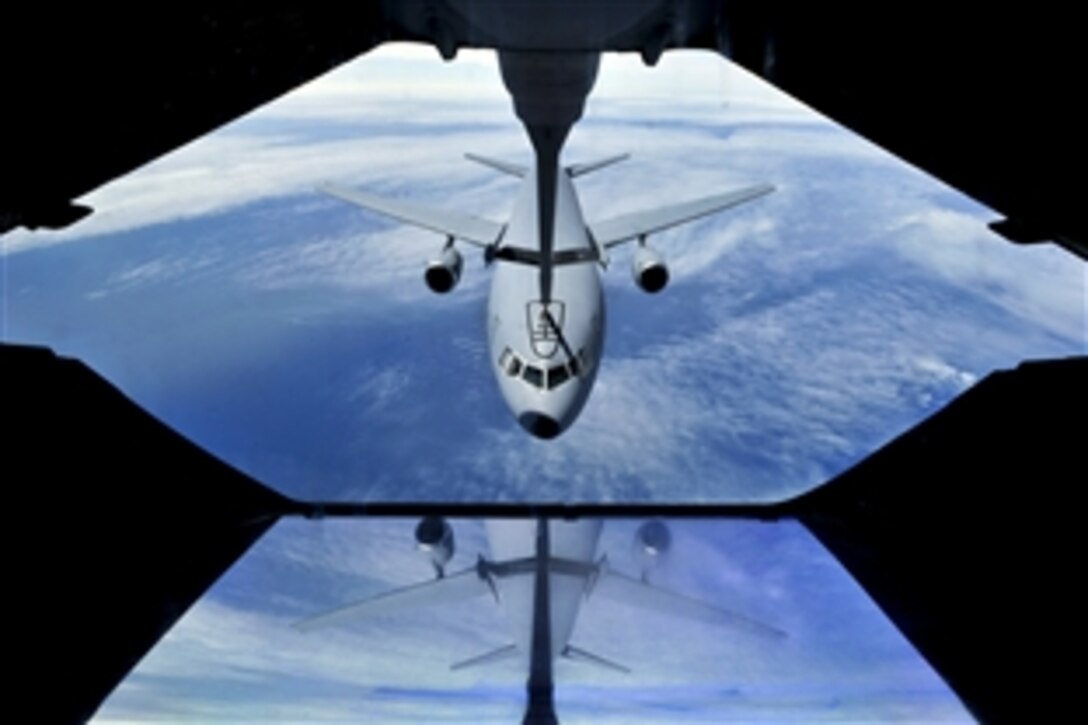 A KC-10 Extender refuels another KC-10 during a training mission over the Atlantic Ocean, May 3, 2012. The aircraft, both assigned to the 305th Air Mobility Wing on Joint Base McGuire-Dix-Lakehurst, N.J., conducted aerial refueling operations to maintain proficiency for worldwide duties.