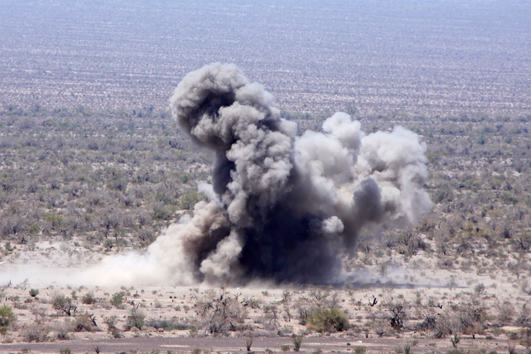 Marines with 1st Air Naval Gunfire Liaison Company Detachment, guided an aircraft to drop a 500 pound GBU-12 bomb on a target, from an observation post, in the Chocolate Mountains, Calif., May 11. The training scenario involved their team conducting close air support operations when they requested assistance from the Tactical Recovery of Aircraft and Personnel Platoon over the radio, after they received contact from a notional local enemy attack force. The training was conducted to increase the competency of the TRAP force and as a part of the ground portion of Realistic Urban Training, which the 15th MEU is conducting in preparation for their deployment scheduled for this fall.