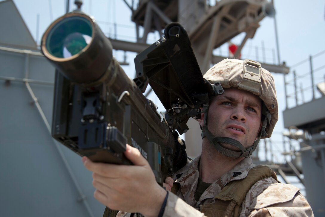 Cpl. Daniel T. Conroy shoulders a surface-to-air missile launcher during search-and-scan training aboard USS Makin Island here May 11. The 21-year-old Boston native serves as a low-altitude air-defense gunner with Marine Medium Helicopter Squadron 268 (Reinforced), the aviation combat element for the 11th Marine Expeditionary Unit. The unit embarked the ship, as well as USS New Orleans and USS Pearl Harbor in San Diego Nov. 14, beginning a seven-month deployment to the Western Pacific, Horn of Africa and Middle East regions.