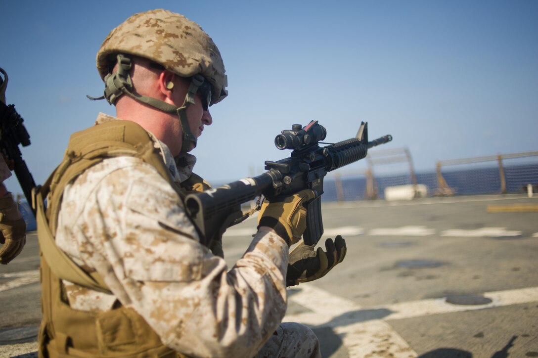 Sgt. Tracey S. Watson reloads an M4 carbine during live-fire training aboard USS Pearl Harbor May 11. The 26-year-old Pocatello, Idaho, native serves as an armorer for Combat Logistics Battalion 11, which provides logistics and services for the 11th Marine Expeditionary Unit. The unit embarked the ship as well as USS Makin Island and USS New Orleans in San Diego Nov. 14, beginning a seven-month deployment to the Western Pacific, Horn of Africa and Middle East regions.