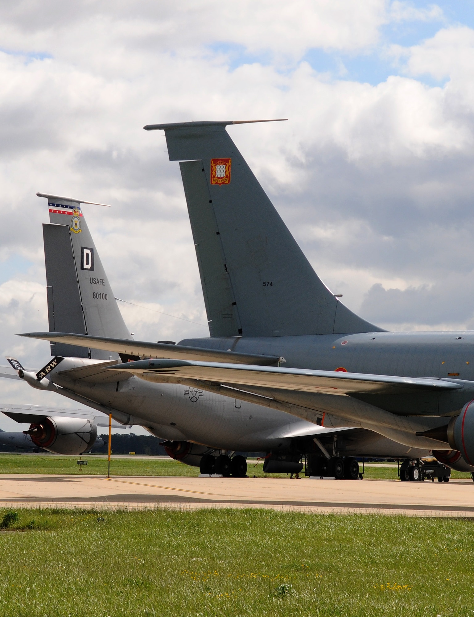 RAF MILDENHALL, England -- A French air force C-135FR Stratotanker is parked in front of a 100th Air Refueling Wing KC-135 Stratotanker during the European Tanker Symposium May 11, 2012. Airmen from Team Mildenhall and visiting forces had the opportunity to see inside these aircraft and an Italian air force KC-767. (U.S. Air Force photo/Senior Airman Rachel Waller)