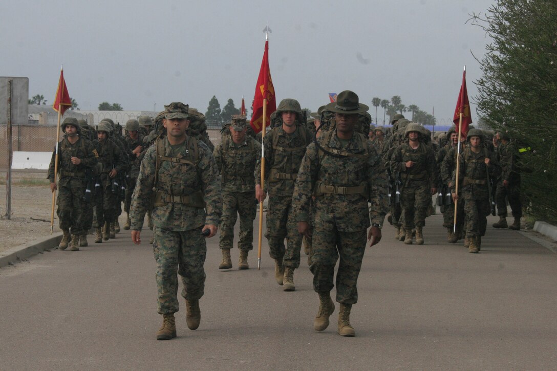 The recruits of Company E, 2nd Recruit Training Battalion, complete a six-mile sustainment hike around base May 12 aboard Marine Corps Recruit Depot San Diego. The sustainment hike helps prepare the recruits for the amount of hiking they'll complete on the Crucible, a 54-hour field-training exercise. More than 50 miles are hiked between obstacles during the culminating event.