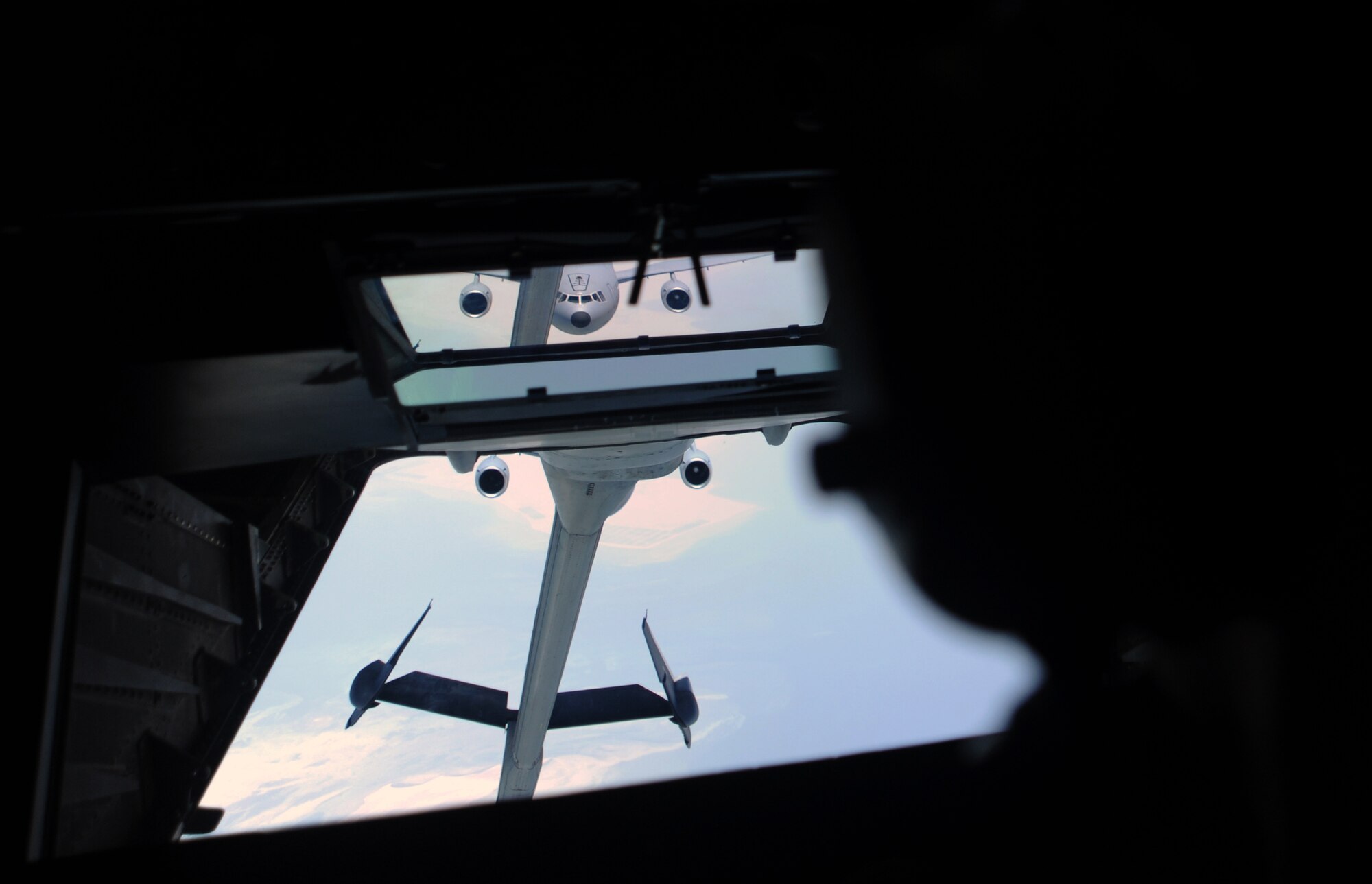 SOUTHWEST ASIA - A KC-10 Extender from the 380th Air Expeditionary Wing approaches another KC-10 for aerial refueling May 11, 2012. Extenders and their crews are able to refuel joint and coalition aircraft as well as carry cargo. During the month of April, the squadron offloaded 23.5 million pounds of fuel over 285 sorties to 2,137 receivers. Both jets and their crews are deployed from Joint Base McGuire-Dix-Lakehurst. (U.S. Air Force photo/Staff Sgt. J.G. Buzanowski)