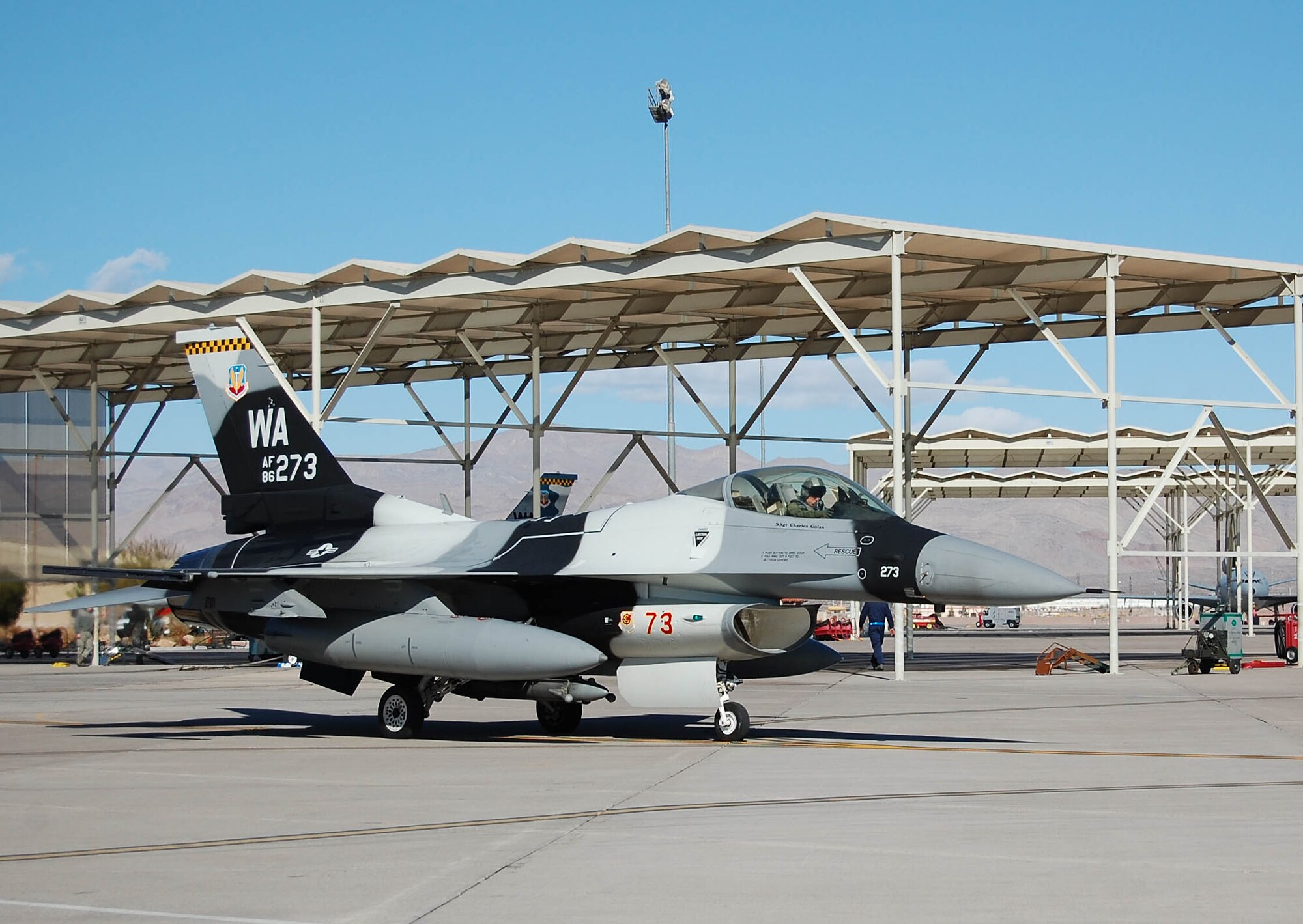 Maj. Joshua Spear, 926th Group, taxis to the runway in an F-16 Aggressor aircraft here Jan. 7. Spear is a Reserve pilot integrated into the Regular Air Force's 64th Aggressors Squadron at Nellis Air Force Base, Nev. (U.S. Air Force photo/Maj. Jessica Martin)
