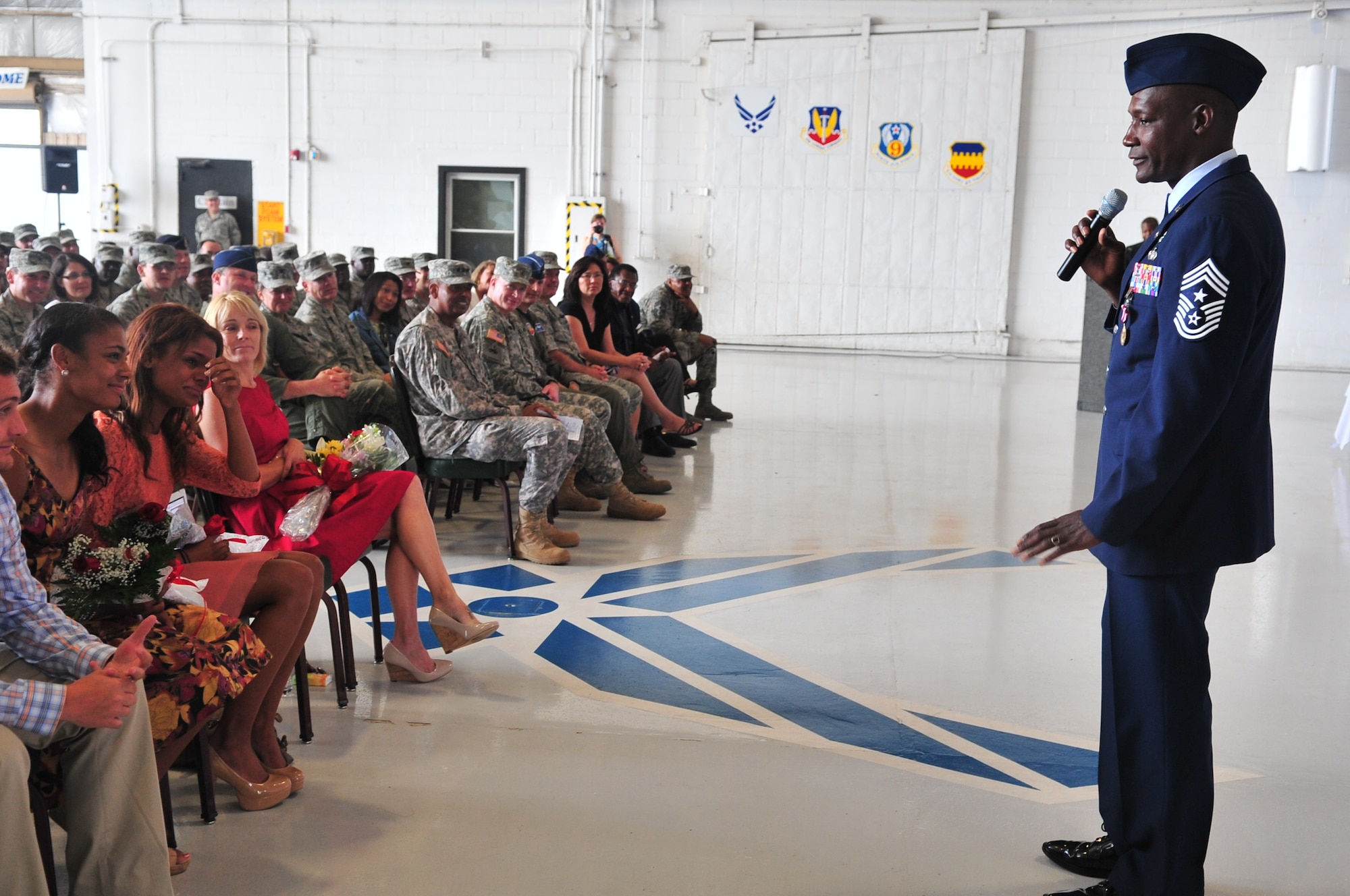 U.S. Air Force Chief Master Sgt. Lefford Fate, 20th Fighter Wing command chief, talks to guests at his retirement ceremony, Shaw Air Force Base, S.C. May 1, 2012. Fate retired after 30 years of service. (U.S. Air Force photo by Airman 1st Class Ashley L. Gardner/ Released)


