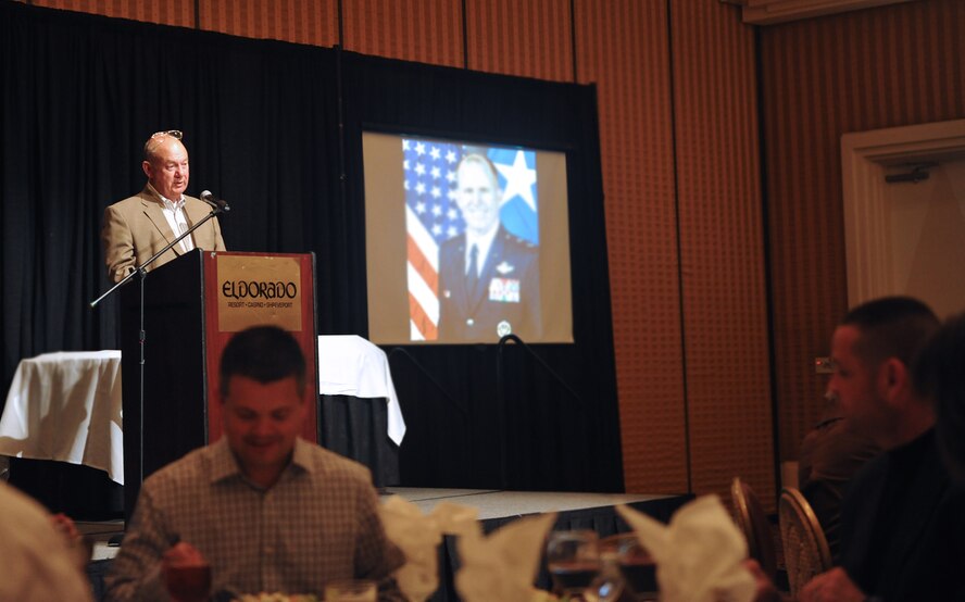 Terry Snook, Eighth Air Force Museum Association president, prepares to introduce the third guest speaker in the association's Distinguished Speaker Series, retired Col. Chuck DeBellevue, May 12, at the Eldorado Resort and Casino in Shreveport, La. The proceeds from the dinner and silent auction support the education and preservation efforts of the Eighth Air Force Museum located near the North Gate on Barksdale Air Force Base. (U.S. Air Force photo/Tech. Sgt. Mike Andriacco)