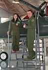 Lindsey Stange, a New Braunfels High School student and recovering cancer patient, is instructed on the capabilities of the T-38 aircraft by  Maj. Tim Menges, 12th Flying Training Squadron instructor pilot May 11, at Joint Base San Antonio-Randolph, Texas. (Air Force photo by Benjamin Faske)
