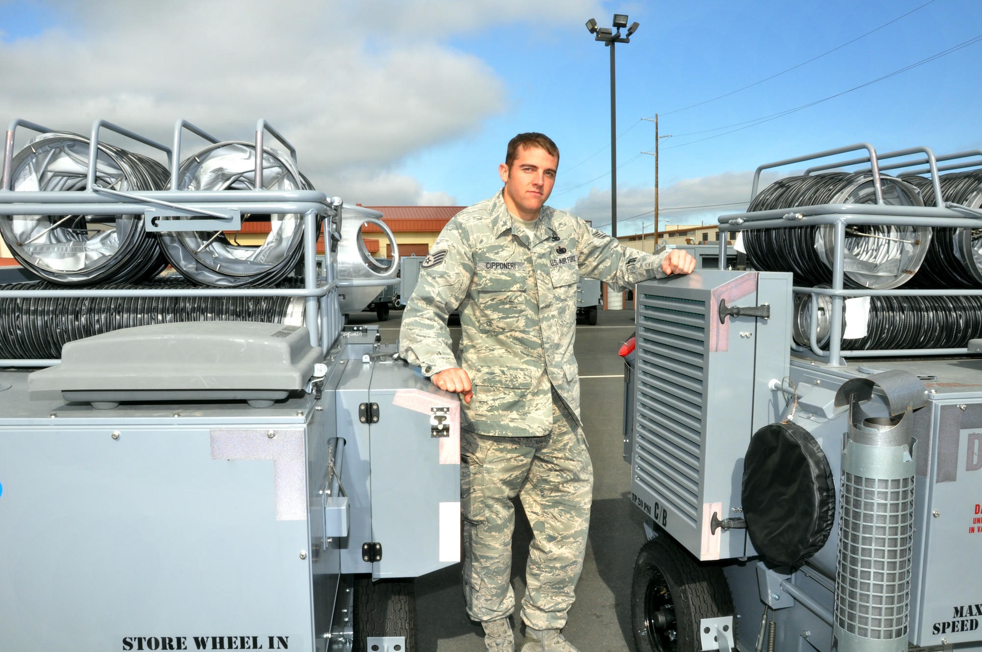 Staff Sgt. Joseph Cipponeri, 60th Maintenance Squadron aerospace ground equipment production control supervisor, stands April 23 beside a Jet Propellant 8-powered new-generation heater, a piece of equipment required for flightline maintenance. (U.S. Air Force photo/Staff Sgt. Patrick Harrower)