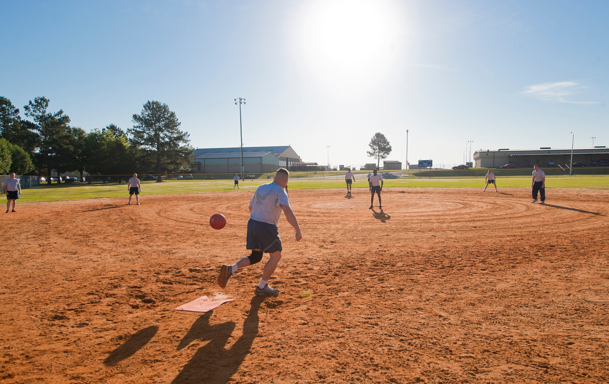 Moody Airmen play kickball as part of Wingman Day at Moody Air Force Base, Ga., May 11, 2012. The day started with a 2-mile run, and then each unit played sports and received fitness briefings to reinforce the physical pillar of Comprehensive Airmen Fitness. (U.S. Air Force photo by Airman 1st Class Jarrod Grammel/Released)
