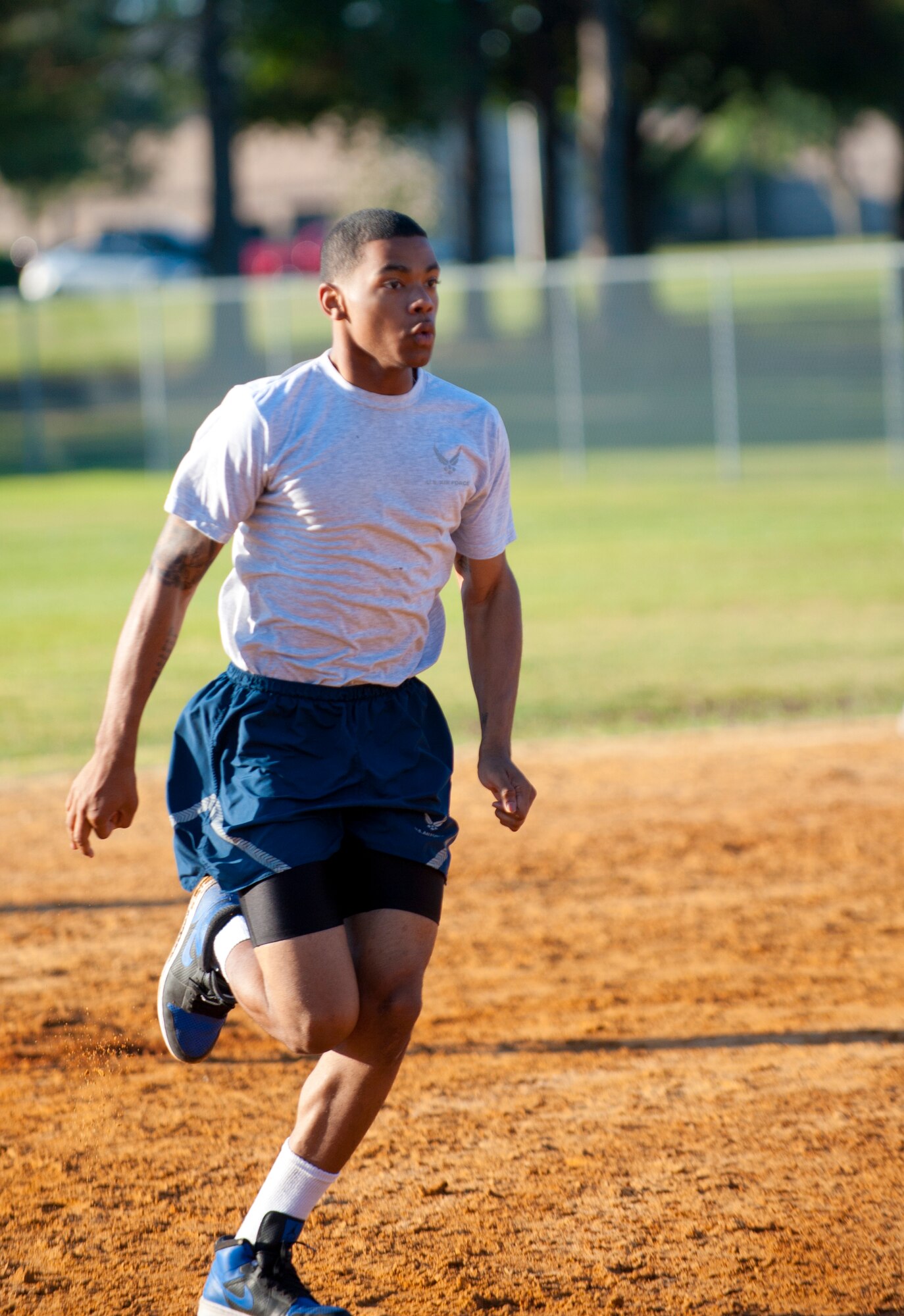 Airman 1st Class Paul Francis, 23d Wing Public Affairs photographer, runs to home base during a kickball game at Moody Air Force Base, Ga., May 11, 2012. Wingman Day’s focus was on the physical pillar of the four-pillar Comprehensive Airmen Fitness initiative. (U.S. Air Force photo by Airman 1st Class Jarrod Grammel/Released)

