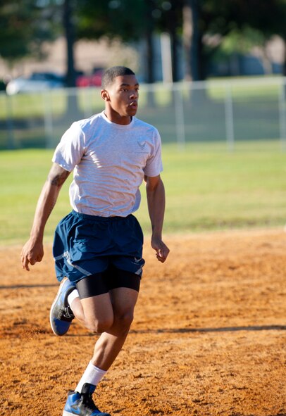 Airman 1st Class Paul Francis, 23d Wing Public Affairs photographer, runs to home base during a kickball game at Moody Air Force Base, Ga., May 11, 2012. Wingman Day’s focus was on the physical pillar of the four-pillar Comprehensive Airmen Fitness initiative. (U.S. Air Force photo by Airman 1st Class Jarrod Grammel/Released)
