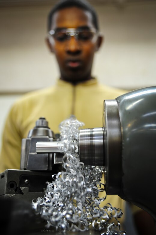 Airman 1st Class Tashma Antoine, an aircraft metals apprentice with the 437th Maintenance Squadron out of Joint Base Charleston, S.C., uses a mill to reduce the diameter of a metal rod to fulfill training requirements May 9, 2012. Antoine works in the aircraft metals fabrication shop where he uses several different pieces of equipment to bend, cut and combine metals together. Antoine is originally from Fort Myers, Fla. (U.S. Air Force photo/Airman 1st Class Dennis Sloan)