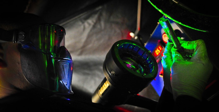 Staff Sgt. Evan Kidd, a non-destructive inspector with the 437th Maintenance Squadron out of Joint Base Charleston, S.C., performs a magnetic particle inspection on bolts used on a C-17 Globemaster III May 9, 2012. The inspection tests for fractures in the metal. (U.S. Air Force photo/Airman 1st Class Dennis Sloan)