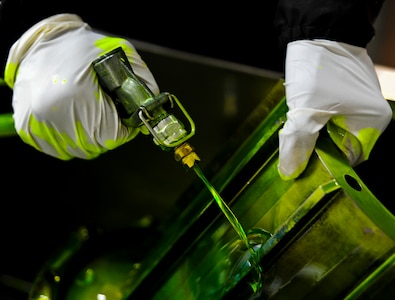 Airman 1st Class James Rogers, a non-destructive inspector with the 437th Maintenance Squadron out of Joint Base Charleston, S.C., sprays a special dye on a torque tube which after drying and placing under black lights will reveal crack and flaws in the metal May 9, 2012. The inspection process can take up to an hour for each tube, running them through three separate chemical baths and a special drying machine. (U.S. Air Force photo/Airman 1st Class Dennis Sloan)