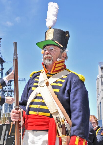 Military members from the five branches of the United States Military, local political leaders, and members of the general public were on hand for the 52nd annual Greater Western New York Armed Forces Week opening ceremony held at the Erie Canal Harbor, May 6, 2012, Buffalo, NY. The Opening Ceremony included music by the American Legion Band of the Tonawandas, a C-130 Flyover from the Niagara Falls Air Reserve Station, Color Guards from throughout WNY, antique military vehicles, and the U.S. Coast Guard with their ceremonial cannon firing a 21-Gun Salute over the Buffalo River. (U.S. Air Force photo by Tech. Sgt. Joseph McKee)