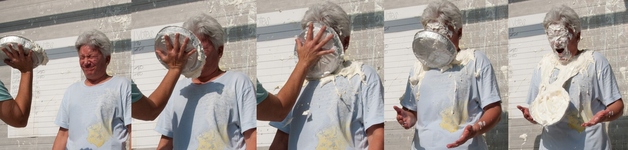 Col. Anna Schulte, 403rd Maintenance Group commander, readies herself to receive a pie in the face during the 403rd Wing's Family Day event May 5. (U.S. Air Force photo illustration by Maj. Heather Newcomb)