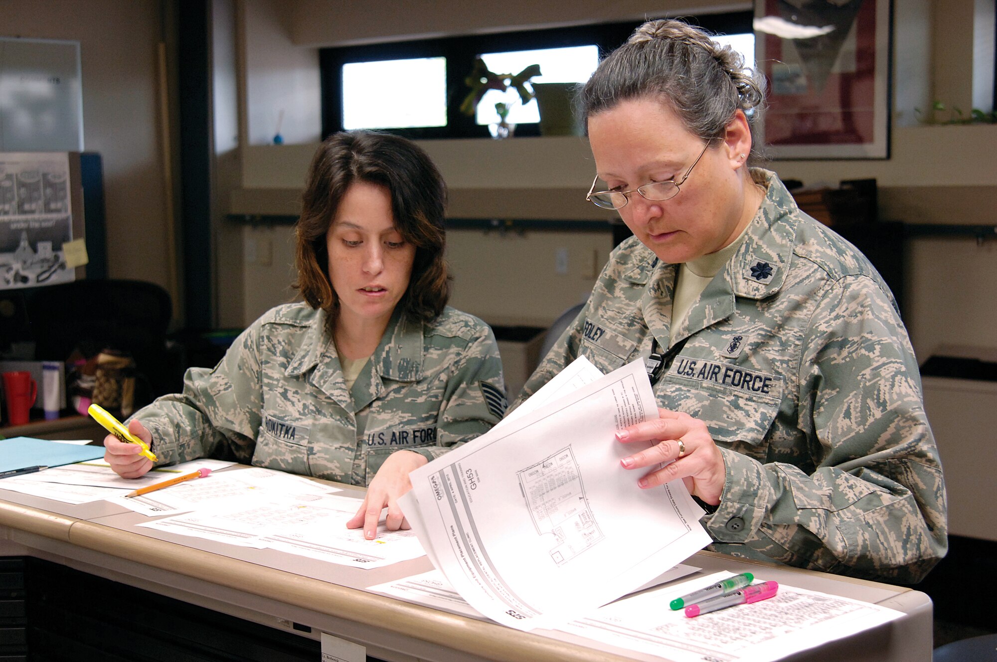 Tech. Sgt. Mary Rokitka, left, non-commissioned officer in charge and Lt. Col. Darlene Foley, flight commander of the 72nd Medical Group’s Education and Training Office, are responsible for the training and oversight of approximately 550 medical personnel in classes from Self-Aid Buddy Care to Basic Life Support. (Air Force photo by Margo Wright)