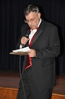 Steve Knechtel, 902nd Force Support Squadron community programs manager and Randolph Idol coordinator, announces the results of the contest at the finale May 4. (U.S. Air Force photo by Chris Anderson)