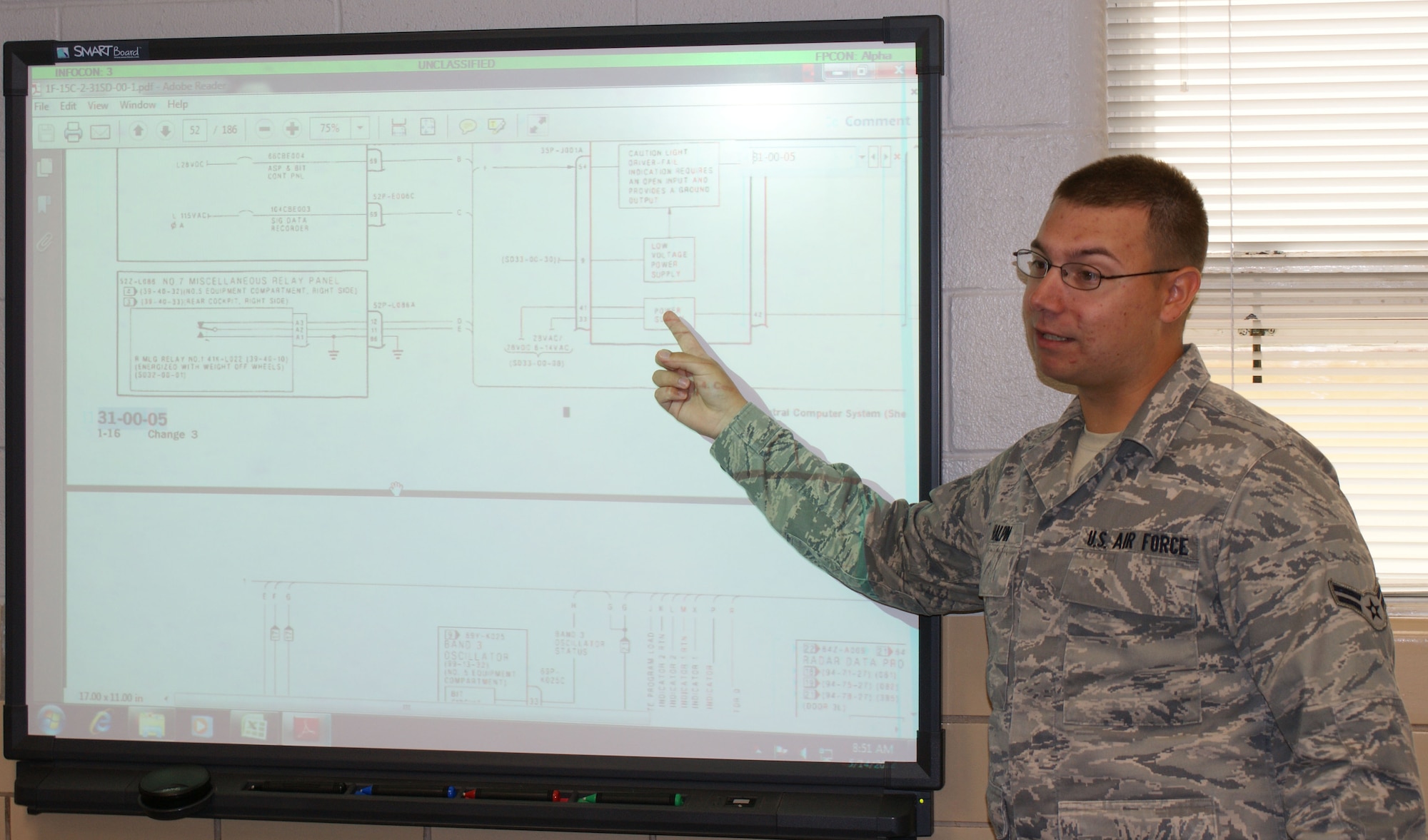 Airman 1st Class Justin Halpin dissects a training problem on a SMART board during the F-15/A-10 Avionics Attack Control Systems "A" shred apprentice course which covers radar and navigation principles  May 14, 2012 at Sheppard Air Force Base.  Halpin, on temporary duty from the 104th Fighter Wing at Barnes Air National Guard Base in Westfield, Mass., is the first-ever ACE Award recipient for the course and will also be the last due to a course reorganization. (U.S. Air Force photo/Dan Hawkins)