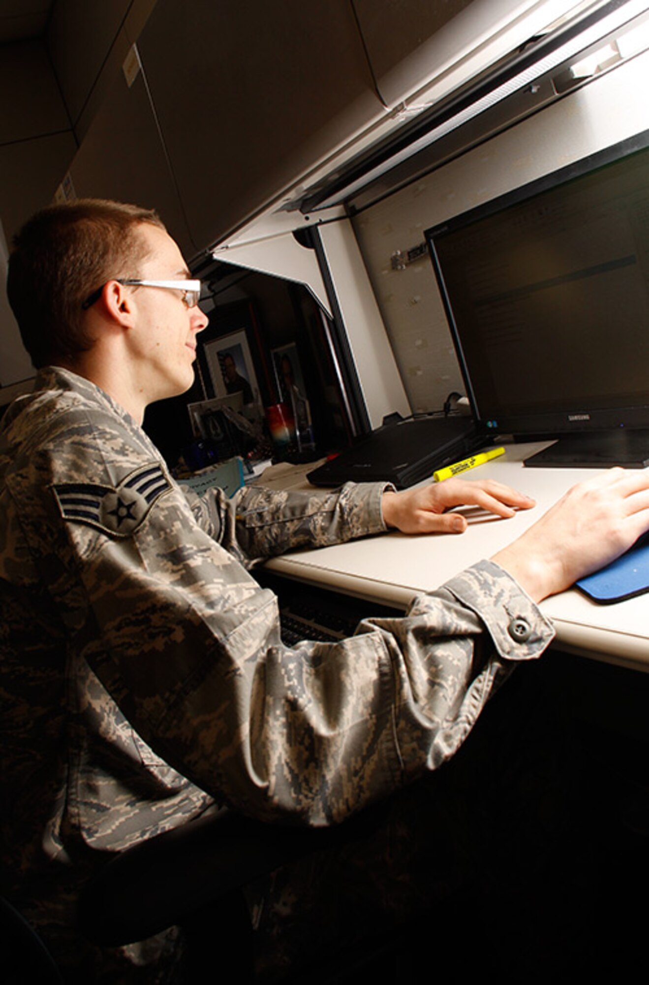 Senior Airman Justin Stechly, a knowledge operator, attached to the 911th Airlift Wing Communication Squadron, works on processing orders in at the 911th Orderly Room, May 5, 2012. In addition to processing orders, Stechly also works UTAPS and helps with the Base Records Management that is managed out of the Orderly Room as well. (U.S. Air Force photo by Airman 1st Class Justyne Obeldobel/Released)