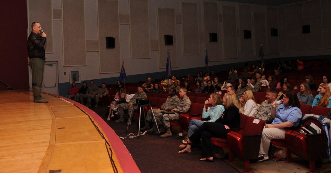Col. Mark Weatherington, 28th Bomb Wing commander, announces the start of Spouse Appreciation Day at the base theater at Ellsworth Air Force Base, S.D., May 11, 2012. Weatherington thanked Ellsworth’s spouses for their hard work and commitment, and then encouraged them to take part in the vast array of activities designed to give them a better understanding of all of the many parts of the wing’s mission. (U.S. Air Force photo by Airman 1st Class Anania Tekurio/Released)