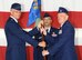 Col. Steven Parker, 340th Flying Training Group commander, passes the guide-on to Lt. Col. Sean Garrett as he accepts command of the 96th Flying Training Squadron in a ceremony at Laughlin Air Force Base, Texas, May 4, 2012. The 96th FTS, which falls under the 340th Flying Training Group at Randolph Air Force Base, Texas, supports Air Education and Training Command’s Specialized Undergraduate Pilot Training. (U.S. Air Force photo/Jose Mendoza)
