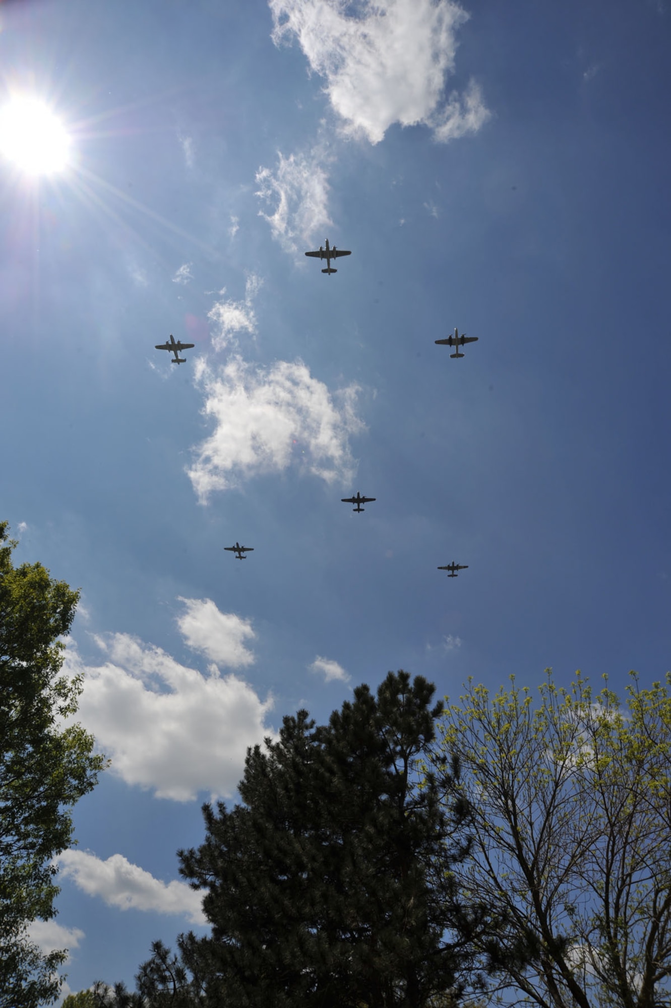 DAYTON, Ohio (04/2012) -- Twenty B-25 bombers took off from and flew over the National Museum of the U.S. Air Force on April 18, 2012, as part of the Doolittle Raiders 70th Anniversary Reunion. (U.S. Air Force photo by Ben Strasser)