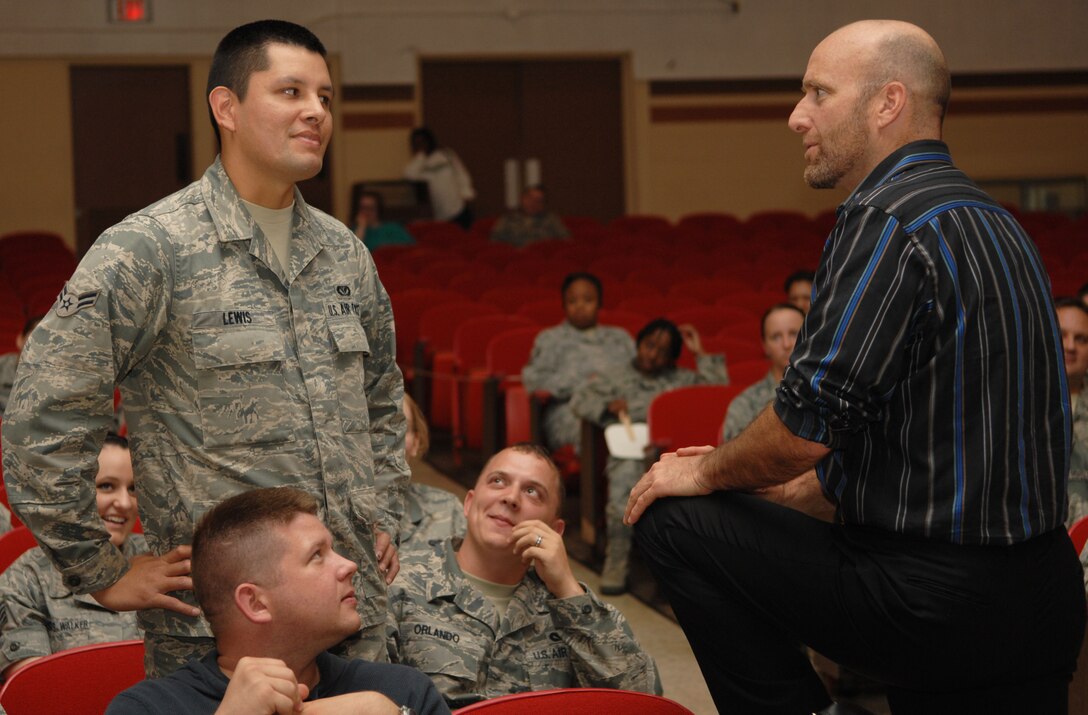 BARKSDALE AIR FORCE BASE, La. – Airman 1st Class Pashala Lewis, 2nd Civil Engineer Squadron structures shop, asks Craig Zablocki a question during an April 17, 2012, Barksdale Sexual Assault Awareness Month event at Hoban Hall. Zablocki was the guest speaker for the bystander intervention training and took the crowd of more than 100 Airmen on a journey of self-discovery. (U.S. Air Force photo/Airman 1st Class Joseph A. Pagán Jr.)