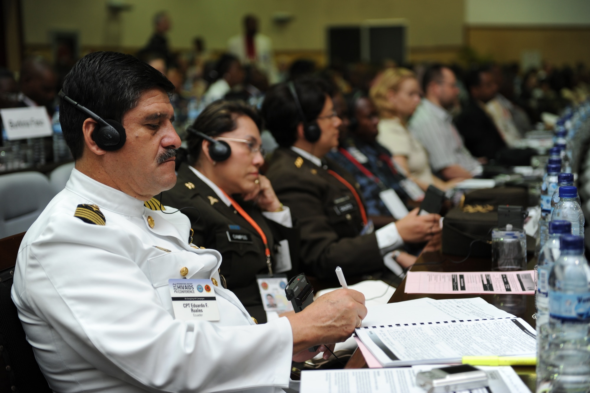 Participants listen to closing remarks for the 2012 International Military HIV/AIDS Conference, May 10. Military and civilian delegates and subject matter experts from 77 nations gathered for the 2012 IMilHAC in Maputo, Mozambique, May 7-10, to share best practices in HIV prevention, care and treatment.