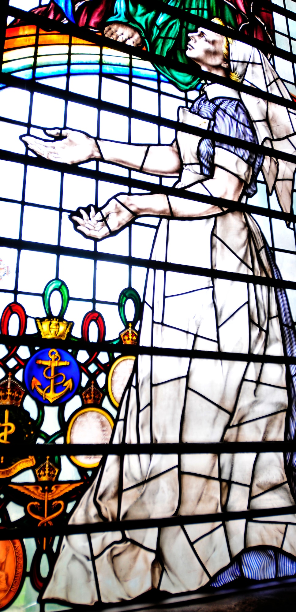 LONDON, England – A nurse is depicted in a stained glass window of the Nurse’s Chapel in Westminster Abbey in London May 9, 2012. Over 40 Airmen and civilians from the 48th Medical Group went to London to visit the Florence Nightingale museum and participate in a service to commemorate the life of Florence Nightingale at Westminster Abbey. (U.S. Air Force photo by Senior Airman Tiffany M. Deuel) 